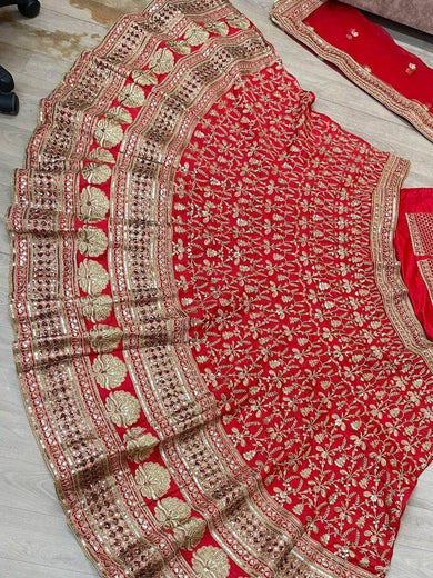 Exciting Red Sequins Embroidredy Silk Wedding Wear Lehenga Choli